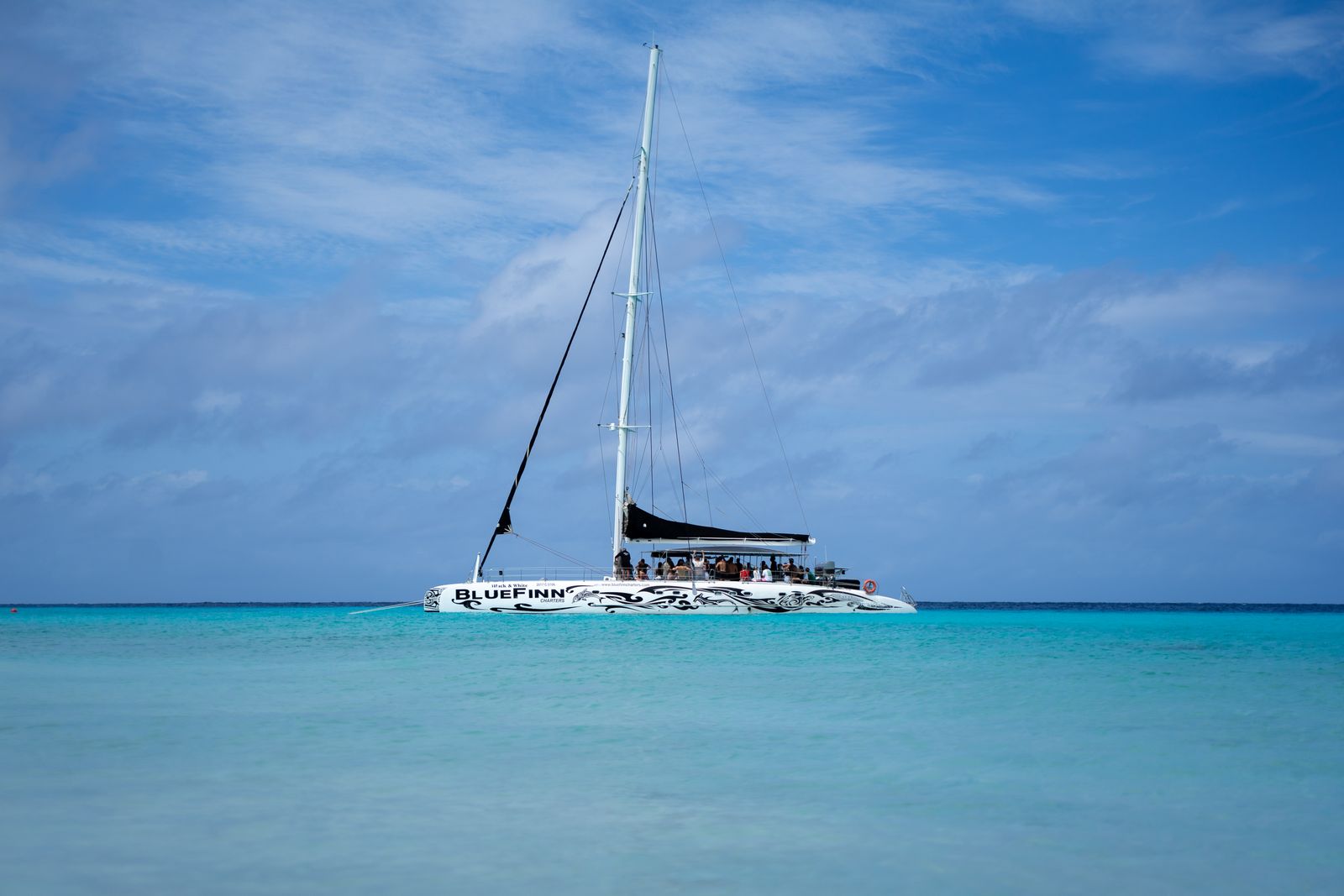 Catamaran sail past Sunset Key